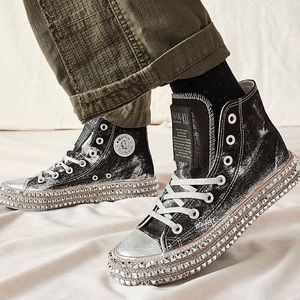 Black studded Converse High Tops via Free People